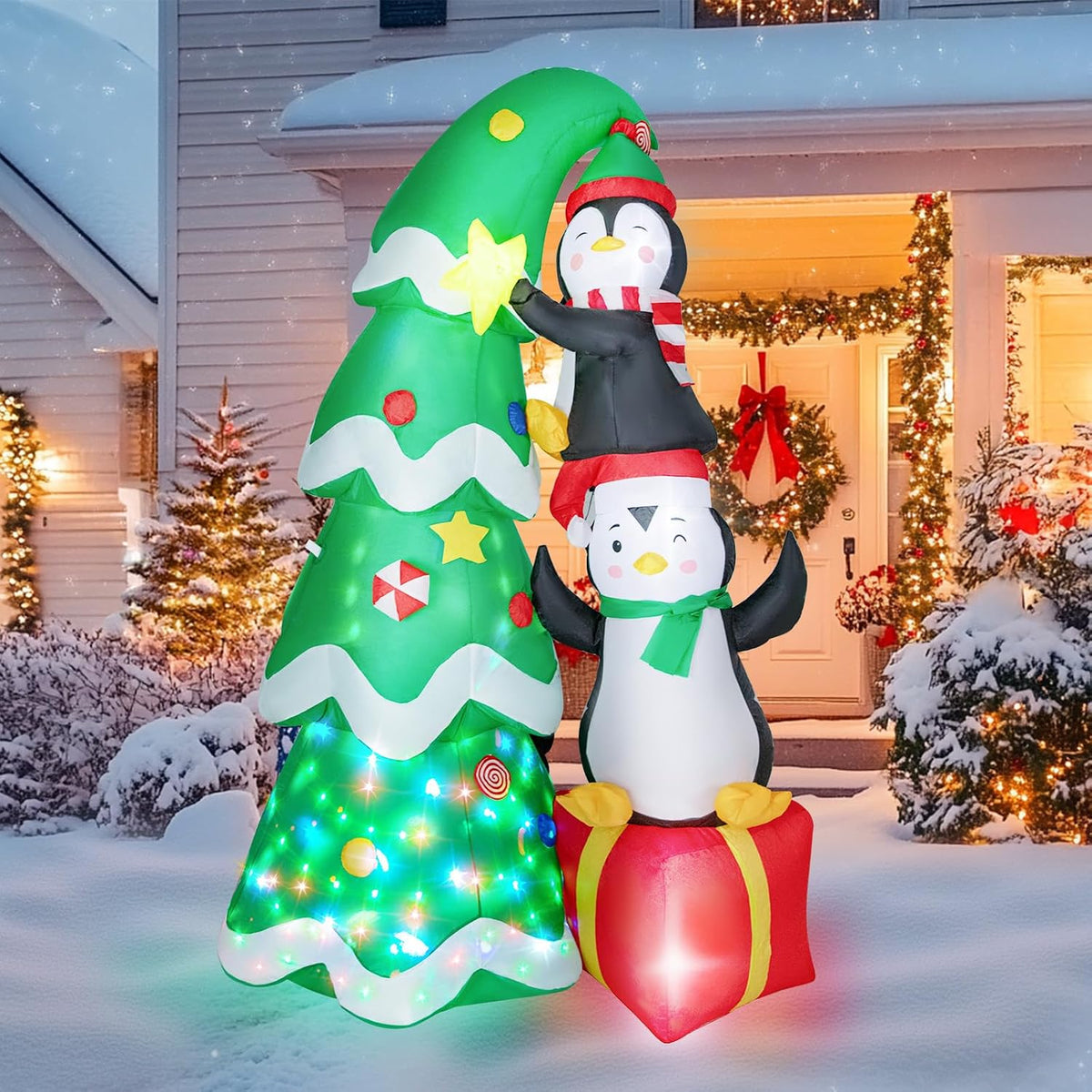 7-Foot Giant Outdoor Penguins holding Christmas Tree Inflatable with LED Illumination Christmas Blow Up Yard Decor